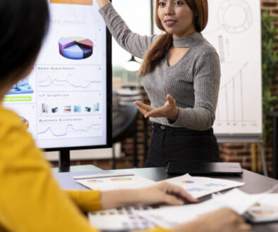 Consultant presents company growth data