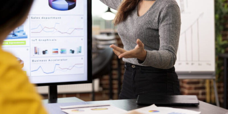 Consultant presents company growth data